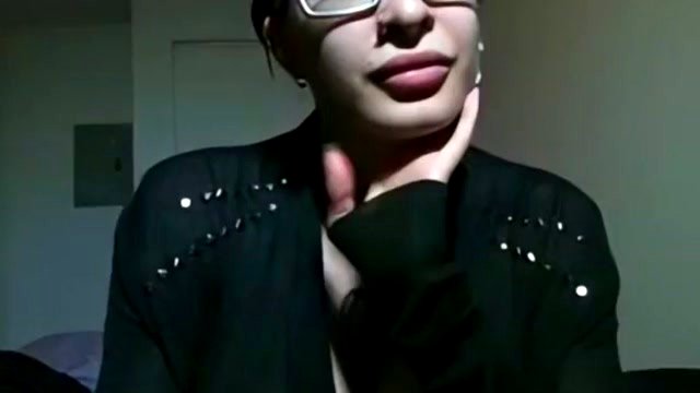 Tattooed girl with huge tits in glasses teases